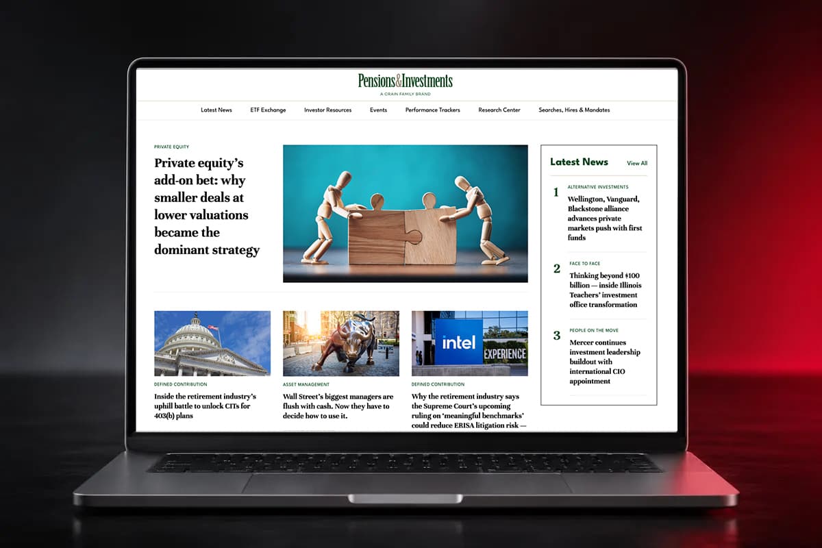 The Pensions & Investments homepage on a laptop